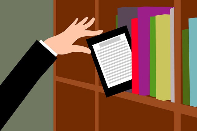 Hand grabbing a book